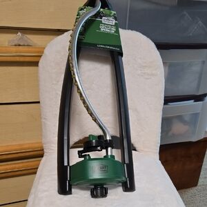 Green and Black Oscillating Sprinkler